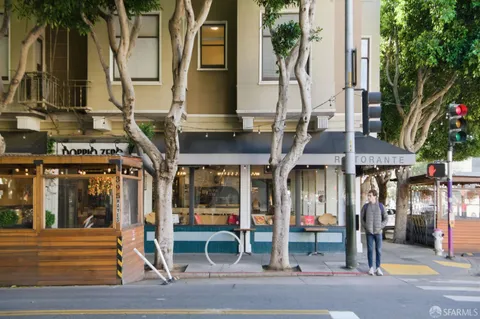 a view of street with sitting area