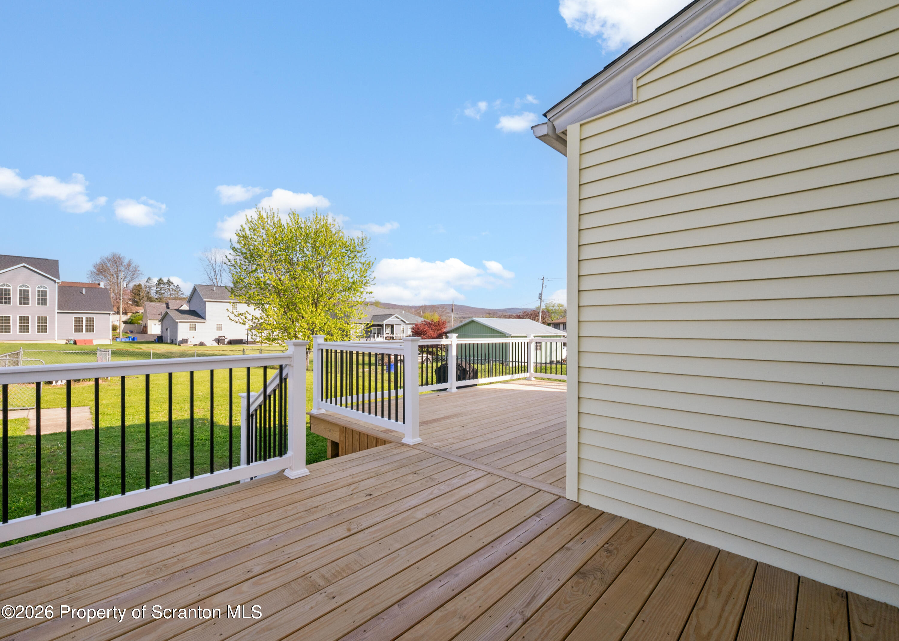 435 Foote Avenue Duryea, PA 18642 - Photo 36 of 51 a view of a balcony with wooden floor