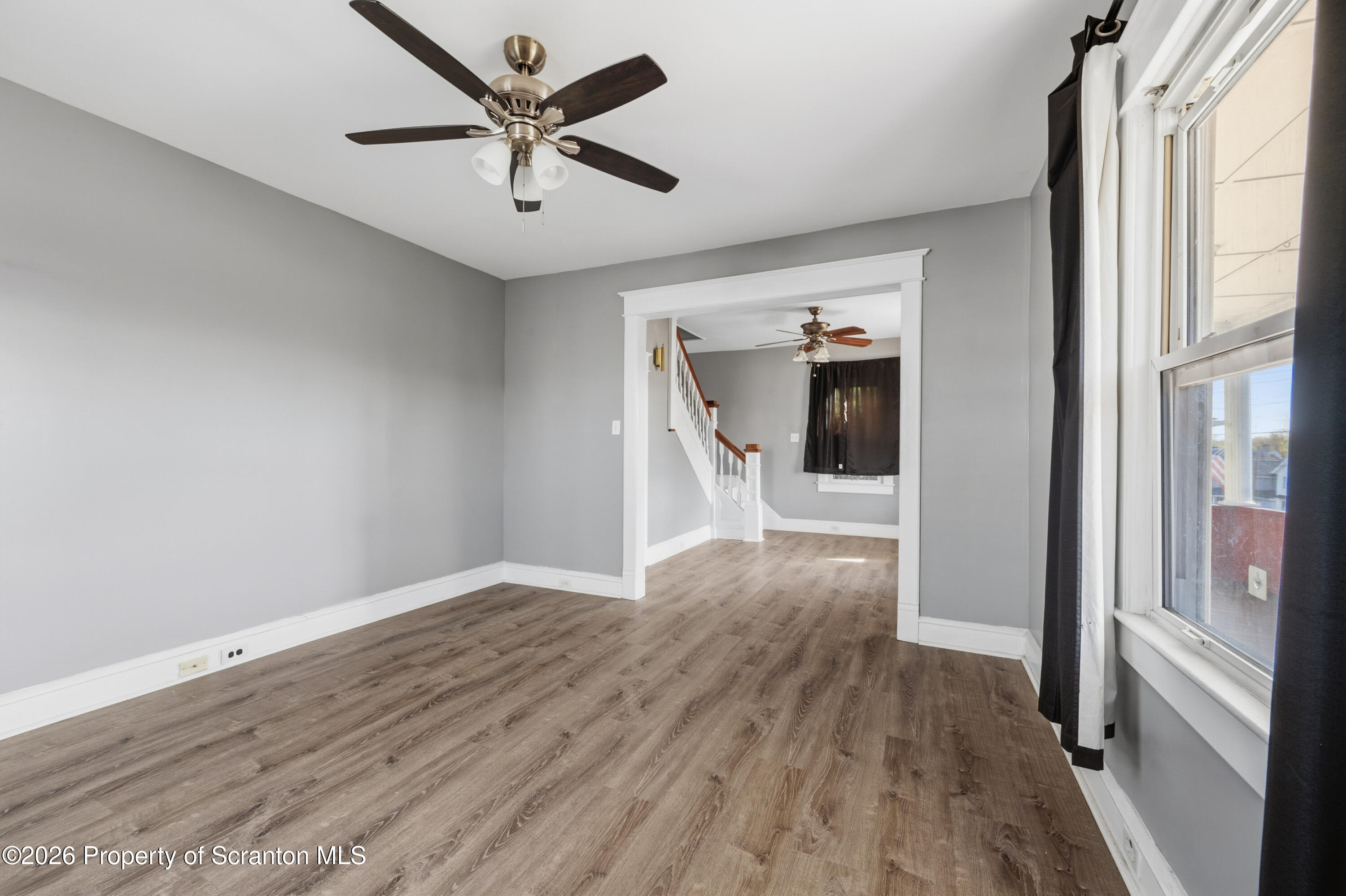 435 Foote Avenue Duryea, PA 18642 - Photo 8 of 51 wooden floor in an empty room and a window