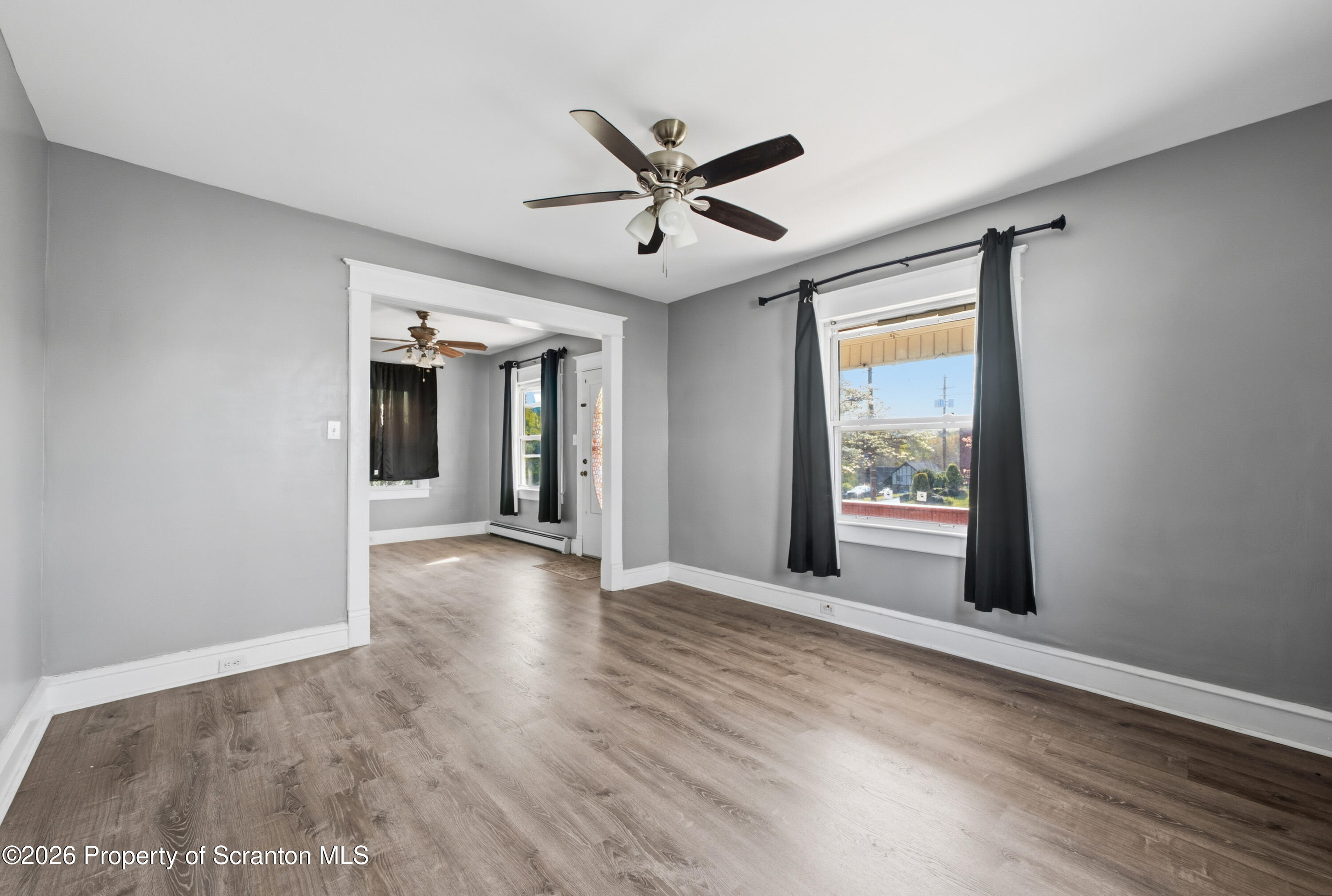435 Foote Avenue Duryea, PA 18642 - Photo 10 of 51 a view of a livingroom with a ceiling fan and window