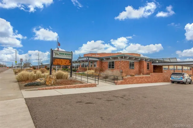a view of swimming pool with outdoor seating