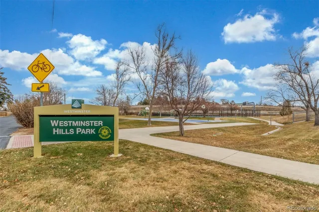 a view of swimming pool with outdoor seating