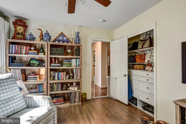a room with furniture and a book shelf
