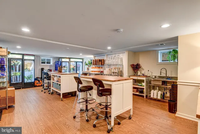 a view of a kitchen and dining room