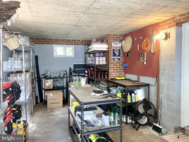 a view of a dining area with furniture and chandelier