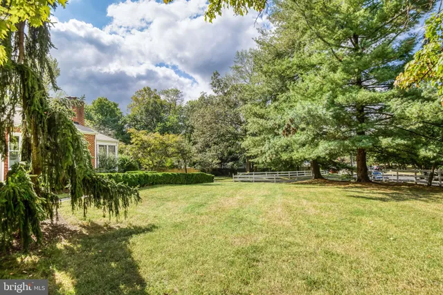 a view of swimming pool with an outdoor space and seating area