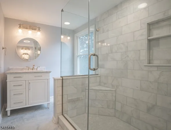 a bathroom with a bathtub and shower