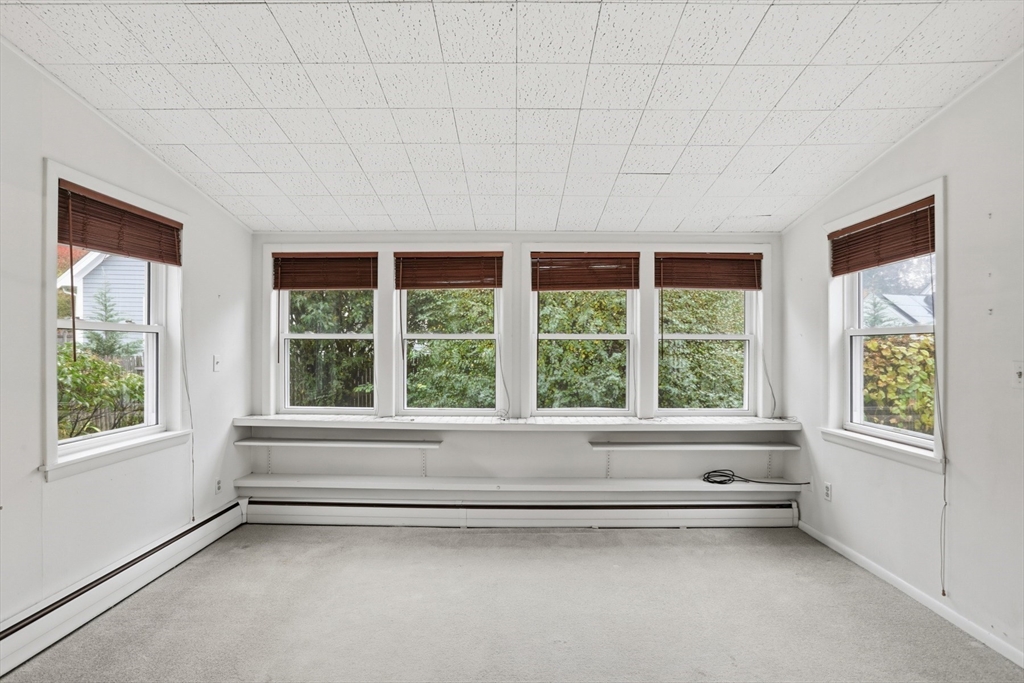12 Canterbury Road Winchester, MA 01890 - Photo 15 of 33 a view of an empty room with a window
