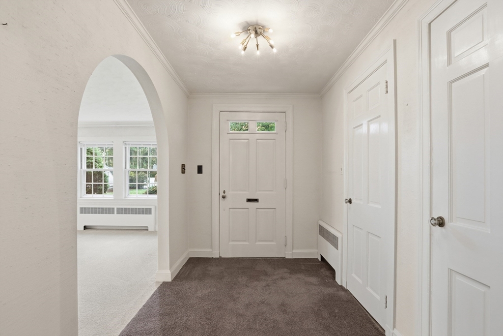 12 Canterbury Road Winchester, MA 01890 - Photo 17 of 33 wooden floor in an empty room with a window