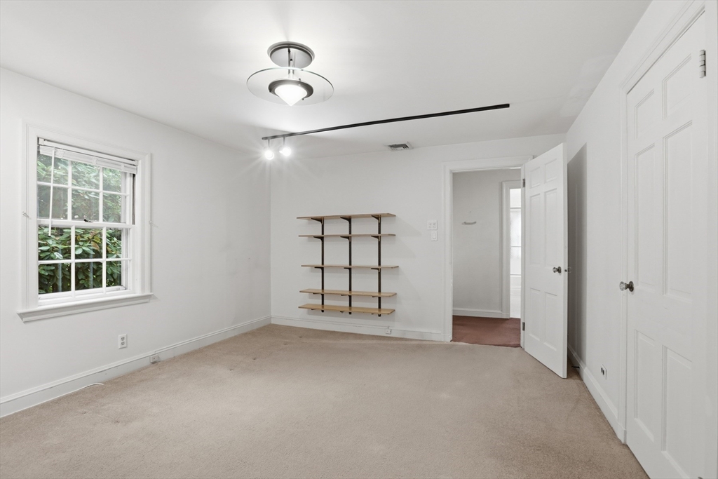 12 Canterbury Road Winchester, MA 01890 - Photo 22 of 33 a view of an empty room with a window