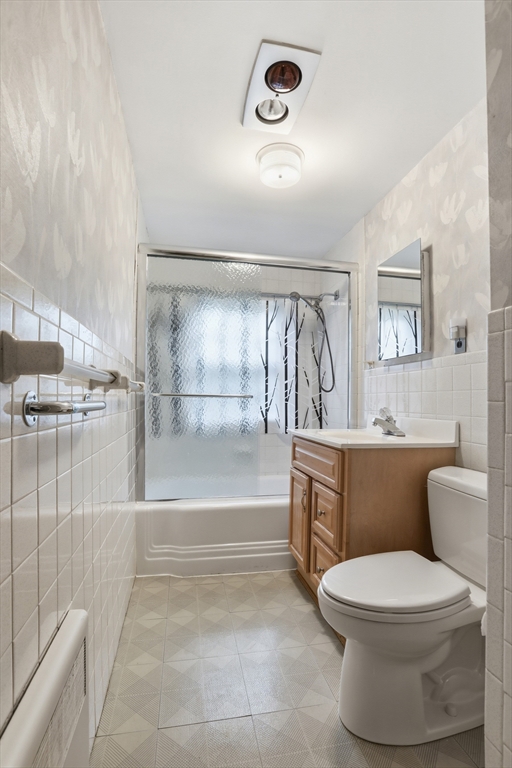 12 Canterbury Road Winchester, MA 01890 - Photo 24 of 33 a bathroom with a toilet sink and shower