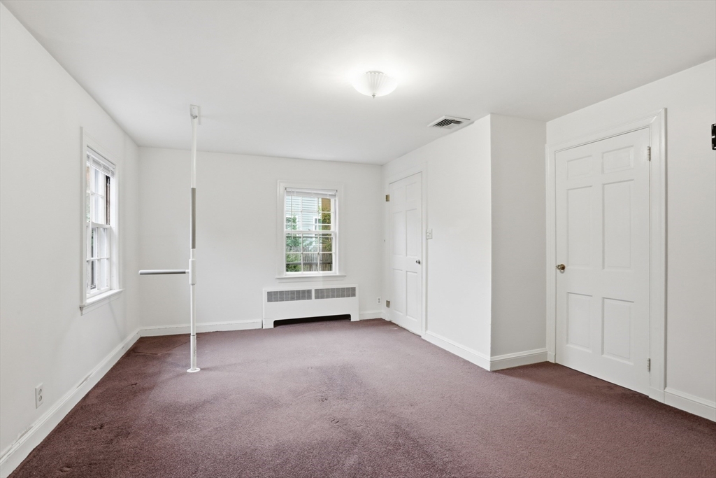 12 Canterbury Road Winchester, MA 01890 - Photo 26 of 33 a view of livingroom with furniture and window