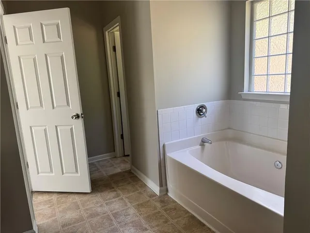 a bathroom with a bathtub