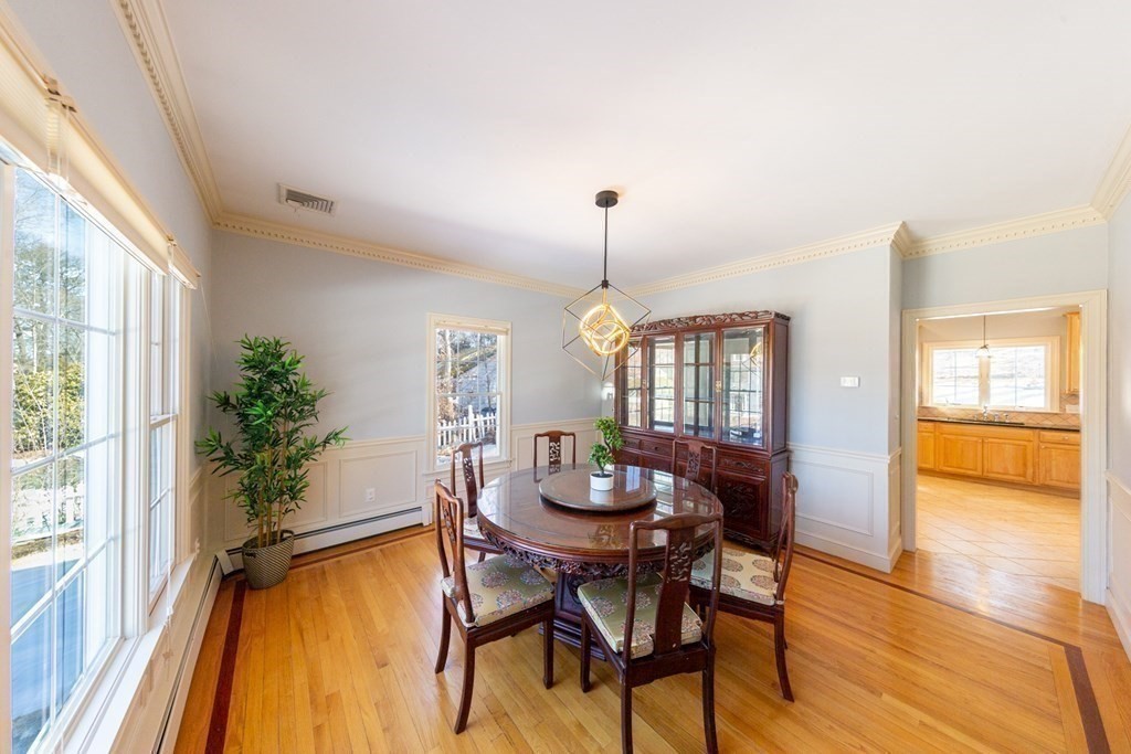 23 Pine Knoll Road Lexington, MA 02420 - Photo 10 of 42 a dining room with furniture and wooden floor