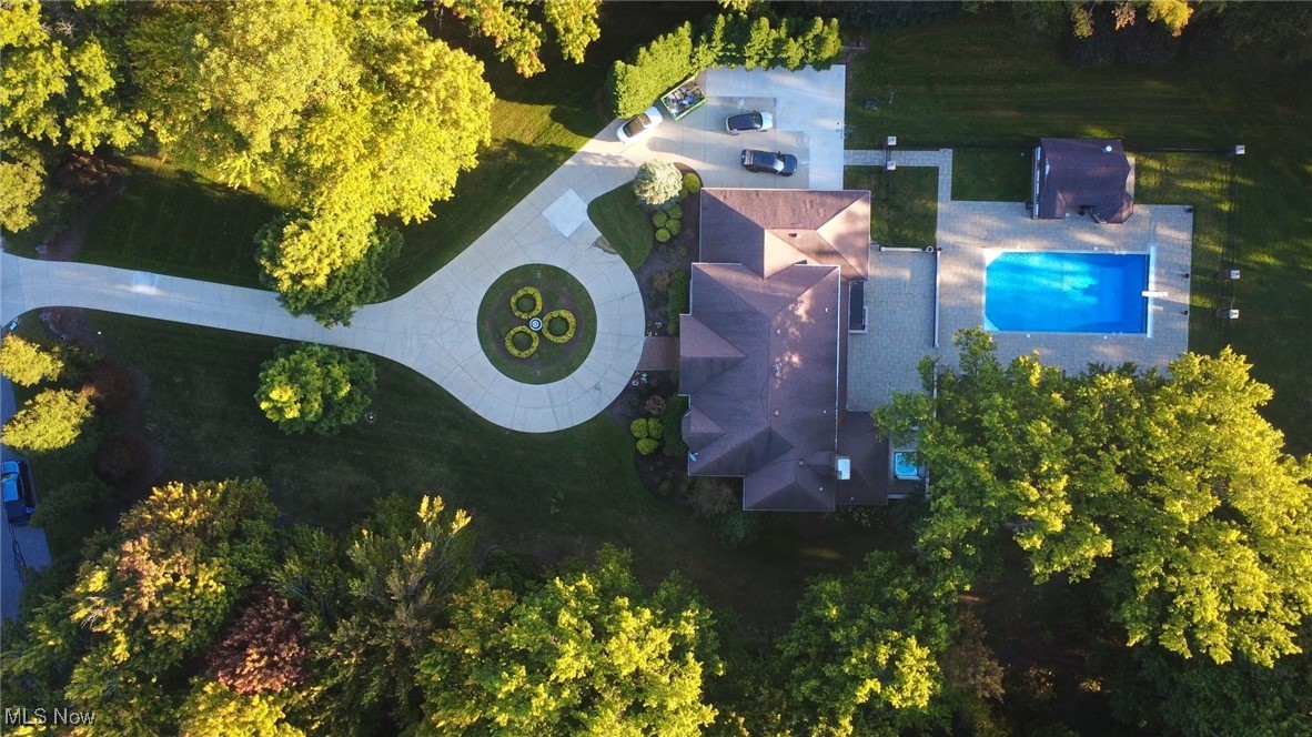 1760 Chartley Road Gates Mills, OH 44040 - Photo 46 of 49 Aerial view of property and surrounding area with a pool area