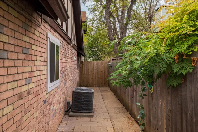 a view of a pathway besides a house