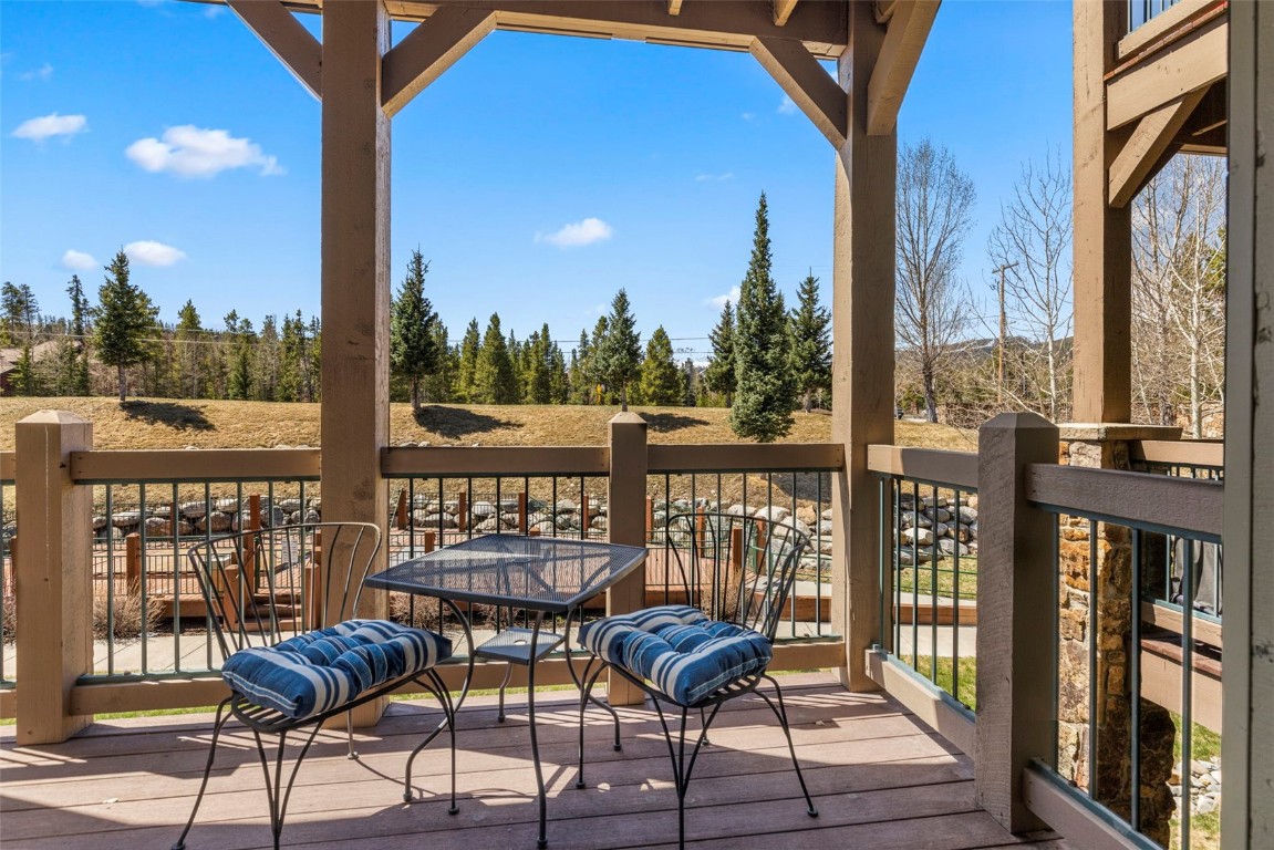 34 Highfield Trail, Unit 209 Breckenridge, CO 80424 - Photo 2 of 24 a view of a chairs on the roof deck