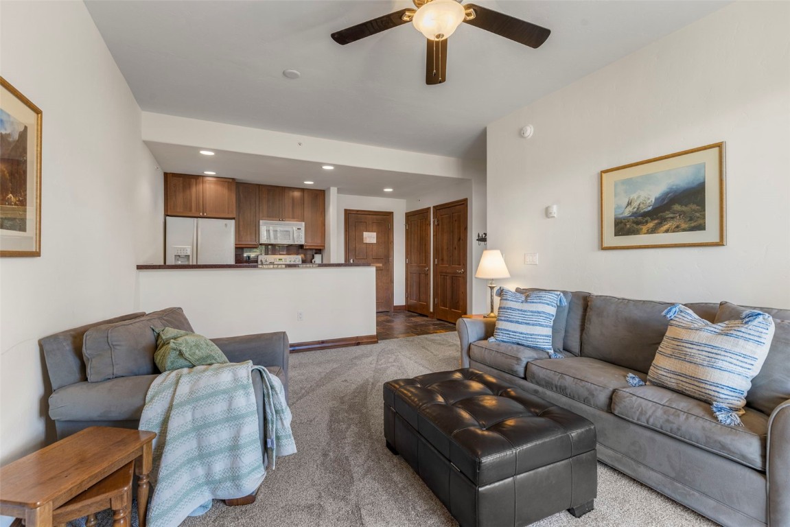 34 Highfield Trail, Unit 209 Breckenridge, CO 80424 - Photo 7 of 24 a living room with furniture and a view of kitchen