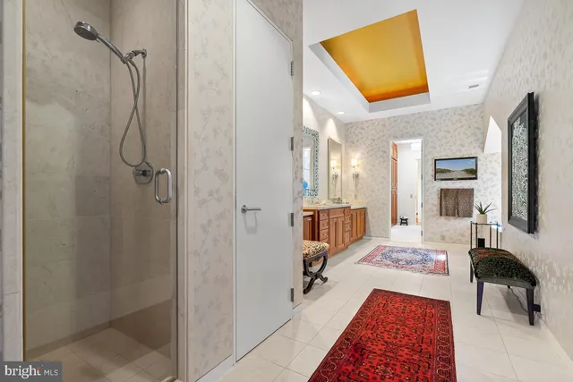 a bed room with furniture and a large window