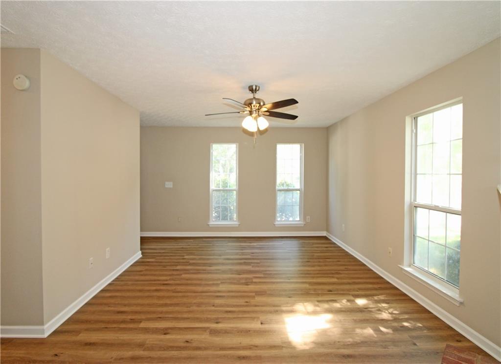 1334 Ambercrest Way Austell, GA 30168 - Photo 4 of 20 a view of an empty room with a window