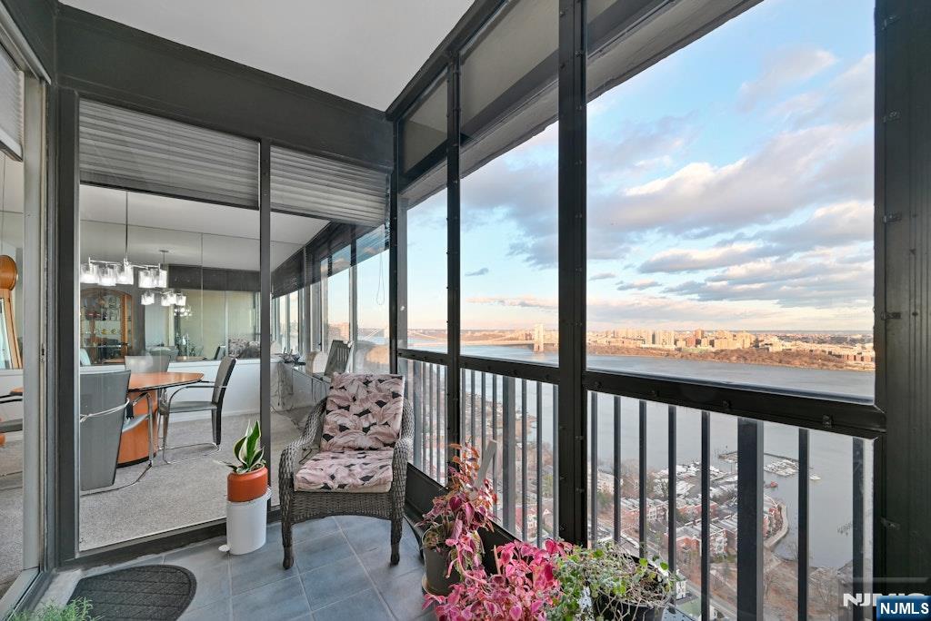 5 Horizon Road, Unit 2909 Fort Lee, NJ 07024 - Photo 20 of 29 a view of a porch with furniture