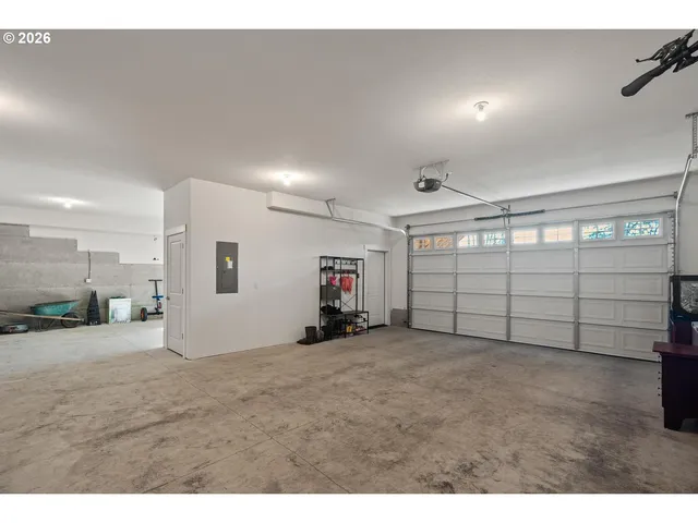 a view of a livingroom with furniture and a window