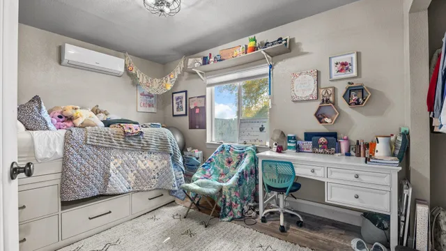 a bedroom with a bed and cabinets