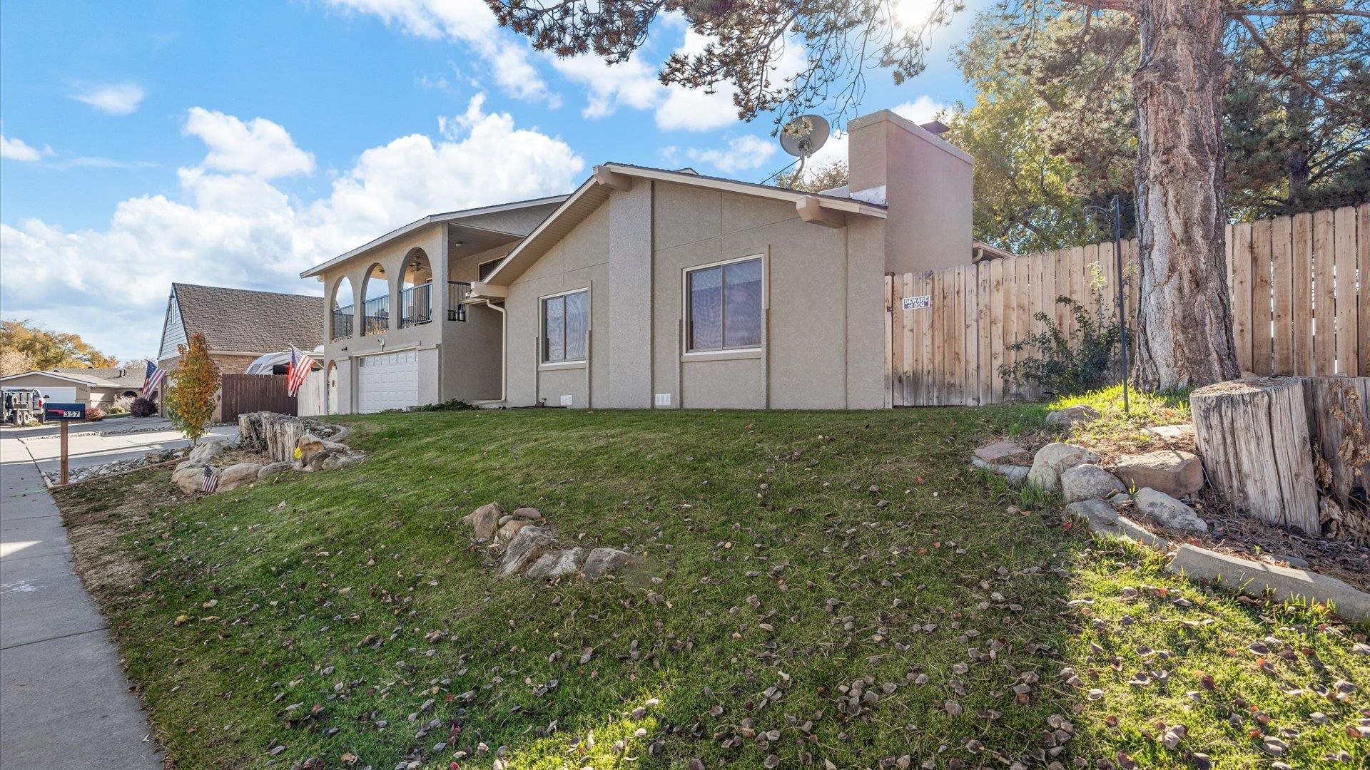 357 Music Lane Grand Junction, CO 81506 - Photo 2 of 29 a view of a house with backyard