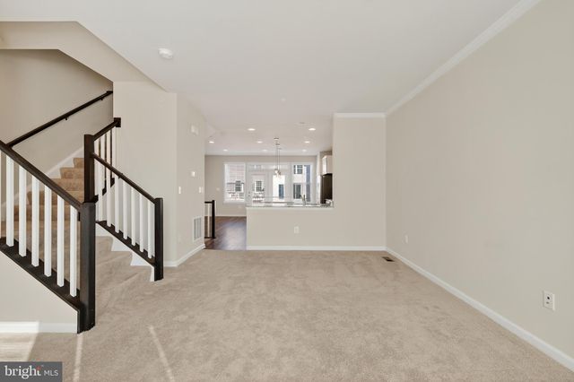 a view of a hallway with staircase