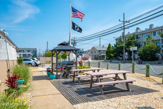a view of a chairs and tables in patio