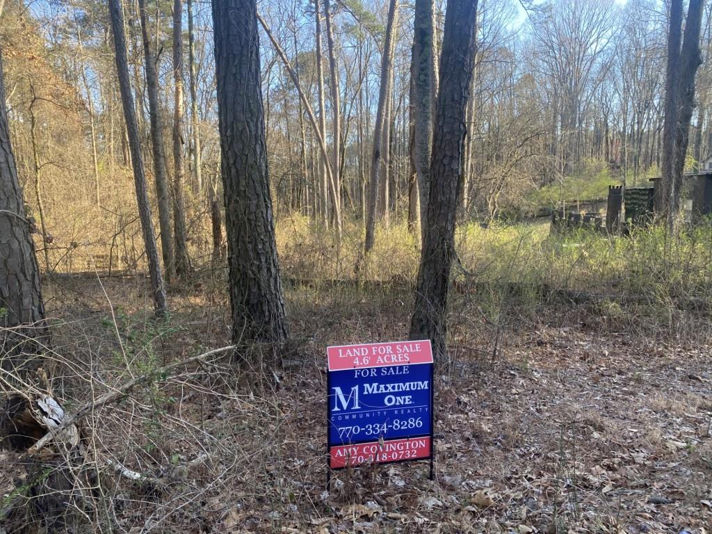 0 Jacobs Road Southeast Acworth, GA 30102 - Photo 6 of 10 a sign that is sitting in front of a house