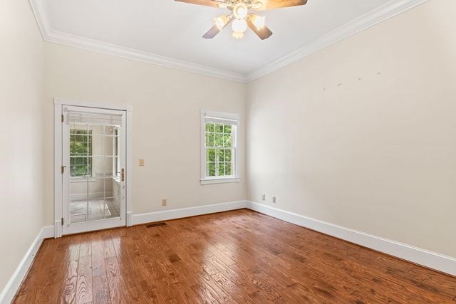 1190 Maple Grove Road Morganton, GA 30560 - Photo 34 of 96 an empty room with wooden floor and windows