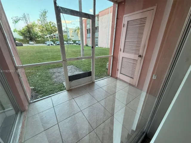 a view of a room with porch and furniture