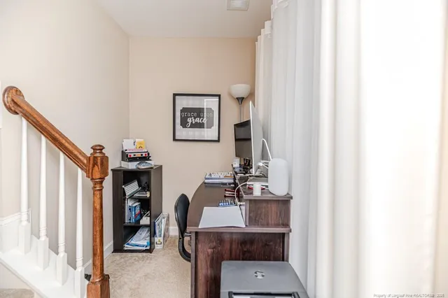 a view of entryway and workspace