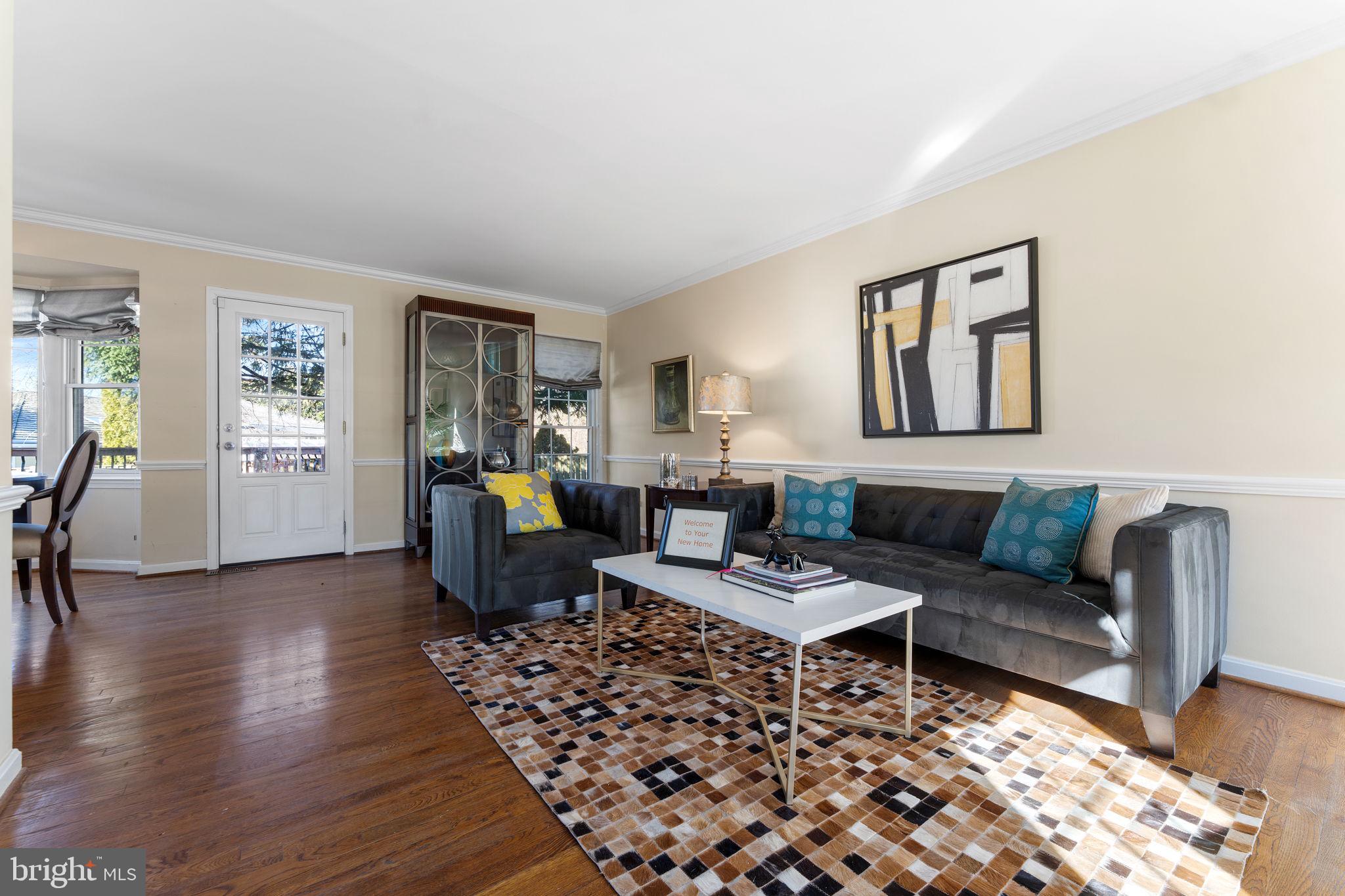 6140 Ramshorn Drive McLean, VA 22101 - Photo 13 of 72 a living room with furniture or couch and a wooden floor