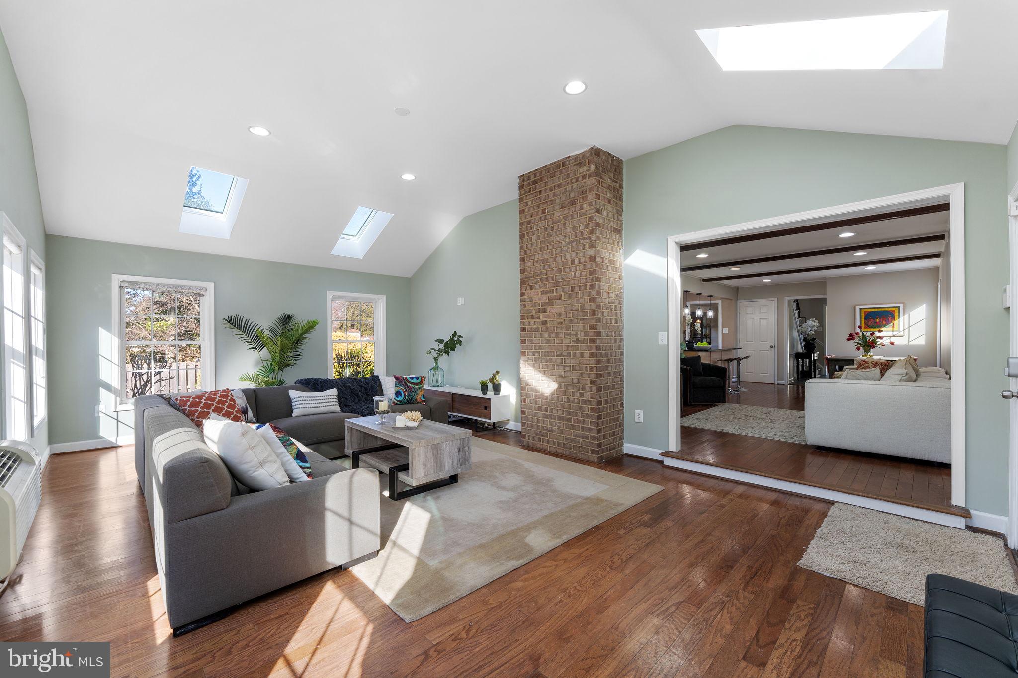 6140 Ramshorn Drive McLean, VA 22101 - Photo 17 of 72 a living room with furniture and a wooden floor