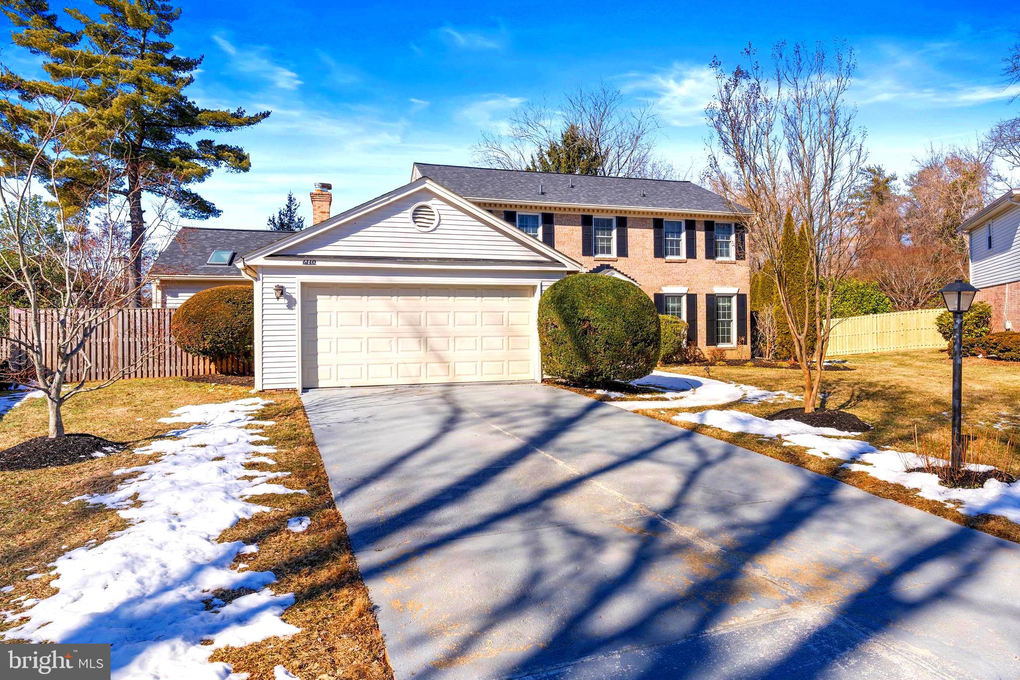 6140 Ramshorn Drive McLean, VA 22101 - Photo 2 of 72 a front view of a house with a yard