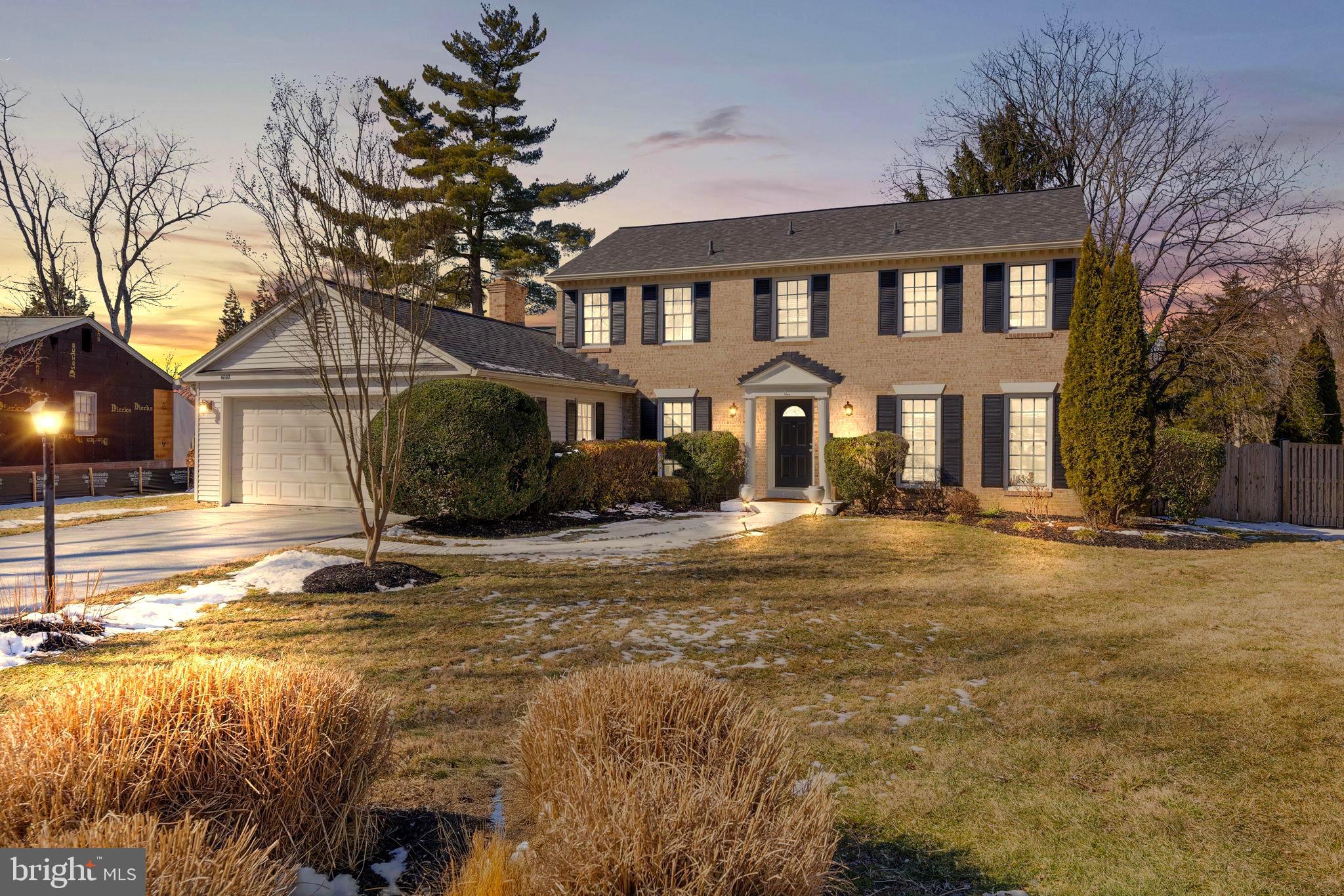 6140 Ramshorn Drive McLean, VA 22101 - Photo 4 of 72 a front view of a house with a yard