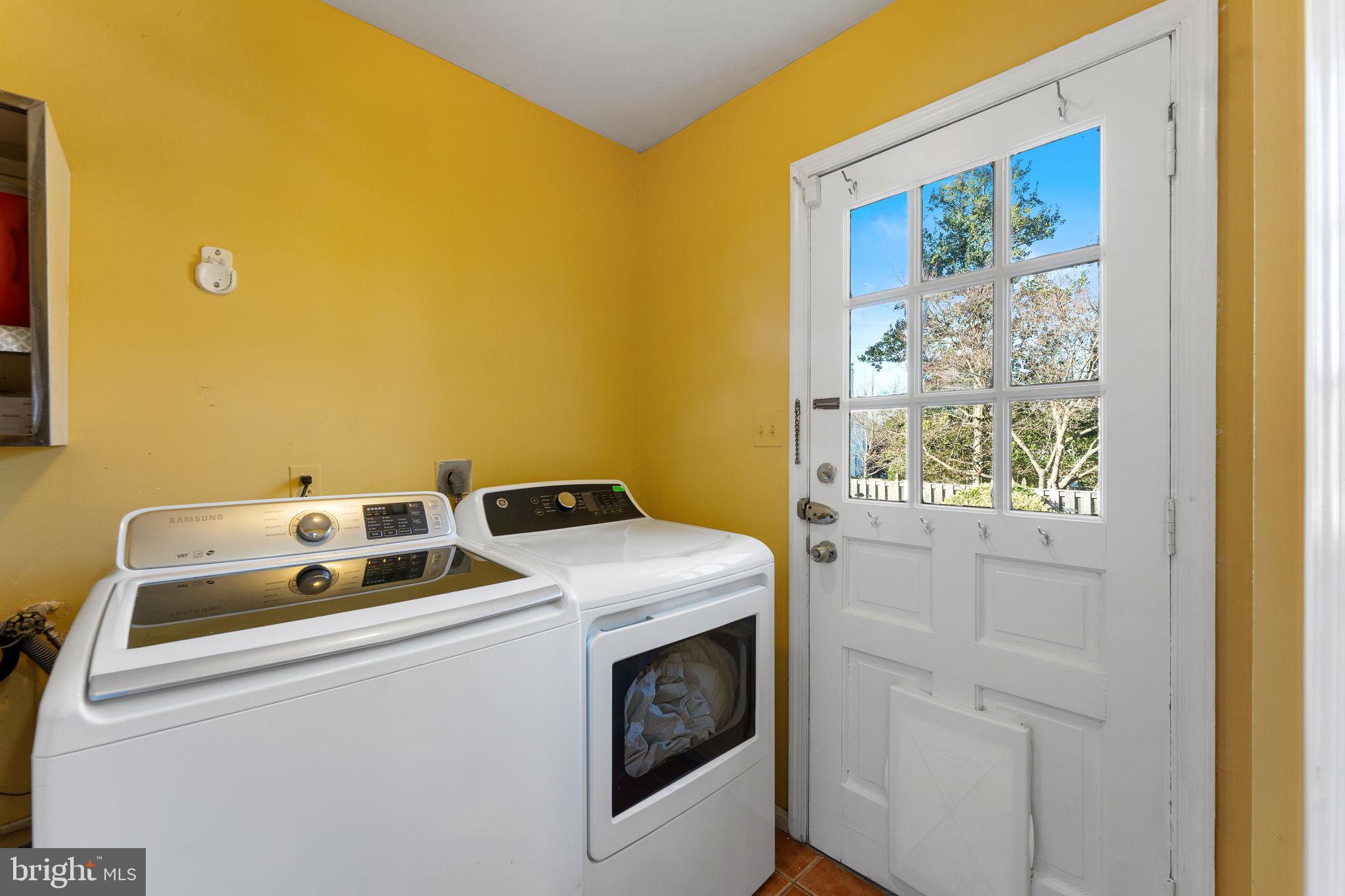 6140 Ramshorn Drive McLean, VA 22101 - Photo 41 of 72 a utility room with dryer and washer