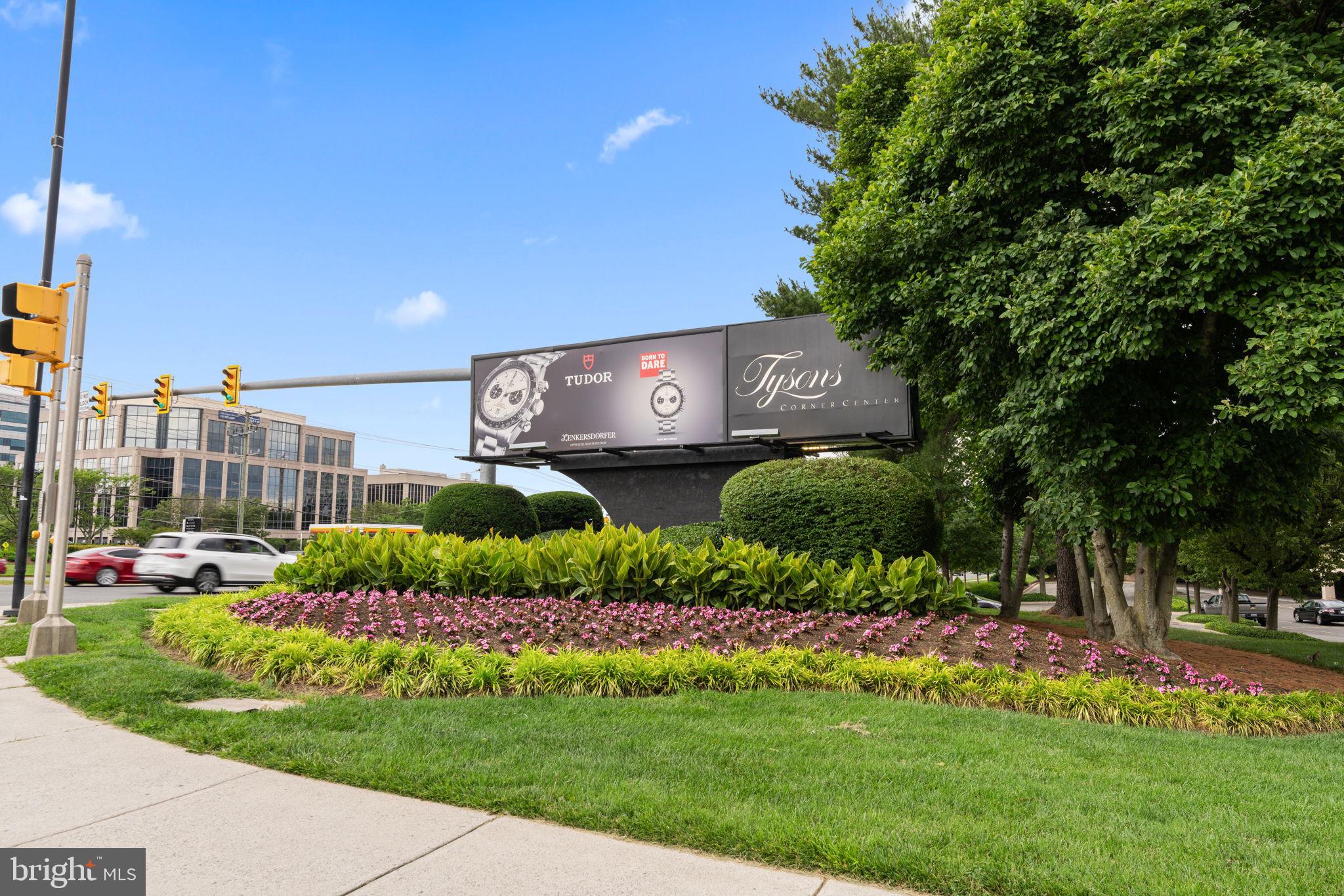 6140 Ramshorn Drive McLean, VA 22101 - Photo 51 of 72 a sign that is sitting in front of a house with a big yard