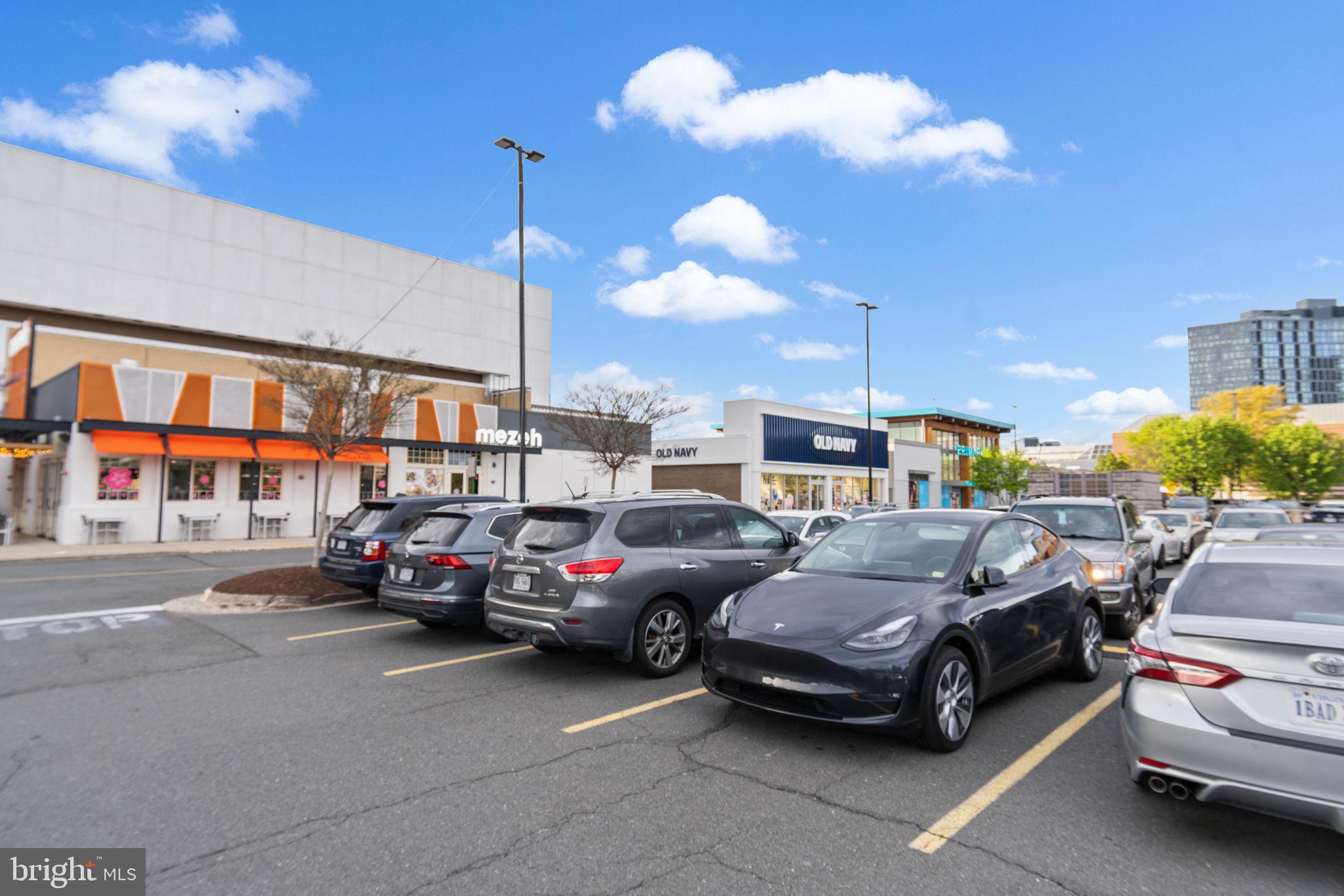 6140 Ramshorn Drive McLean, VA 22101 - Photo 59 of 72 a view of a cars park in front of a building