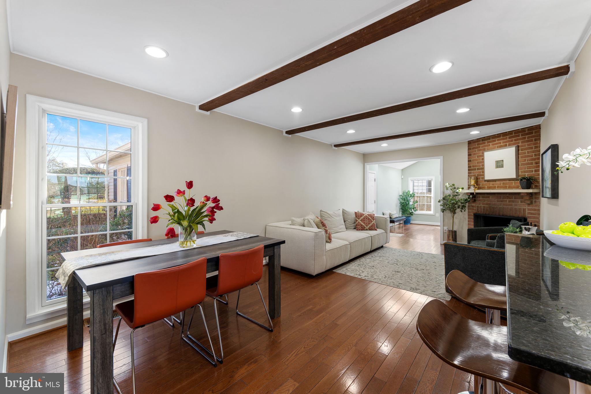 6140 Ramshorn Drive McLean, VA 22101 - Photo 9 of 72 a living room with furniture kitchen view and a table