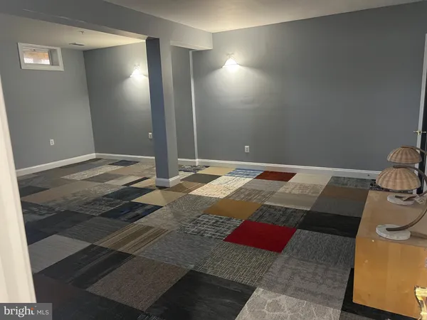 a bathroom with a rug