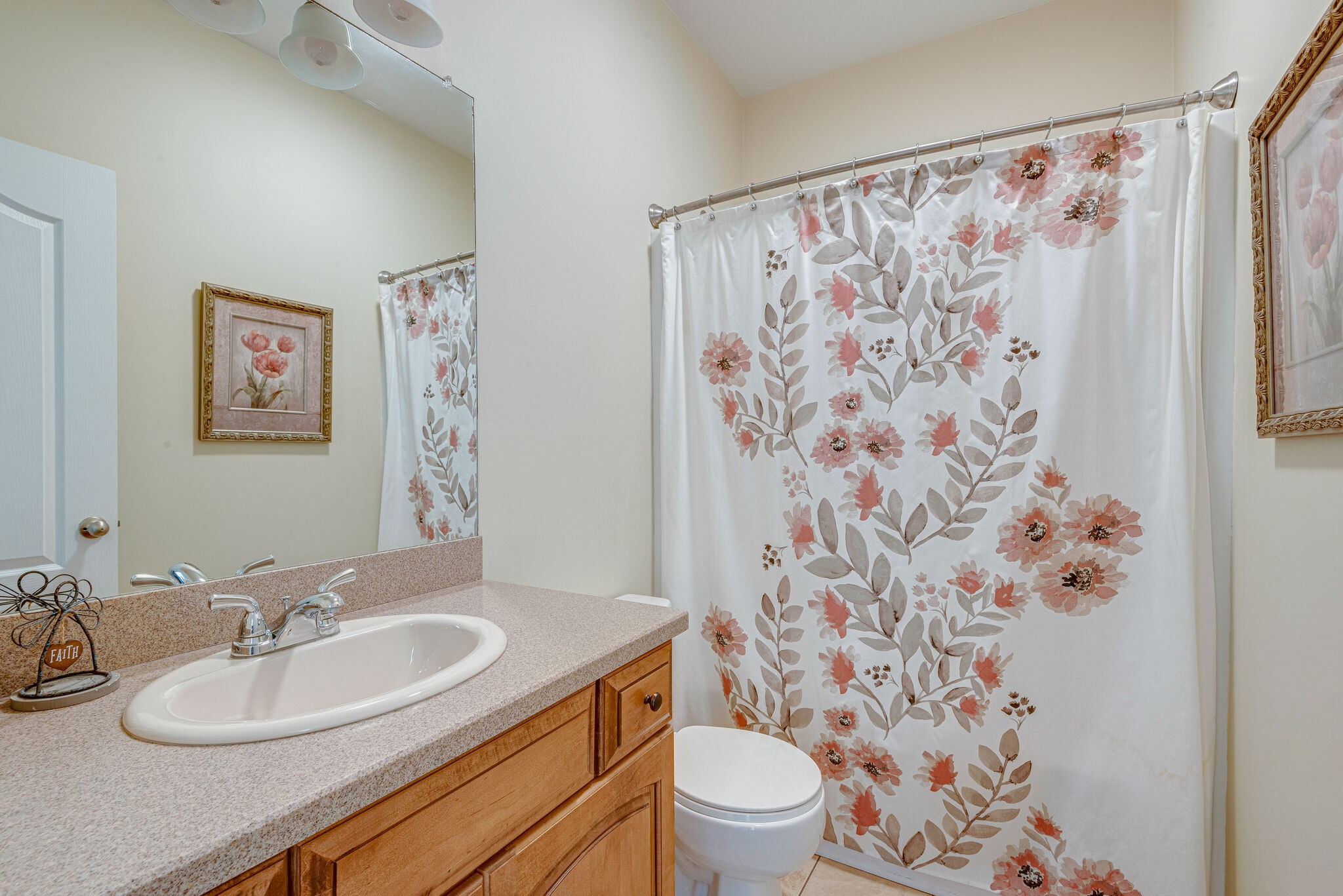 1686 Porter Road Bon Aqua, TN 37025 - Photo 22 of 28 a bathroom with a sink toilet and shower