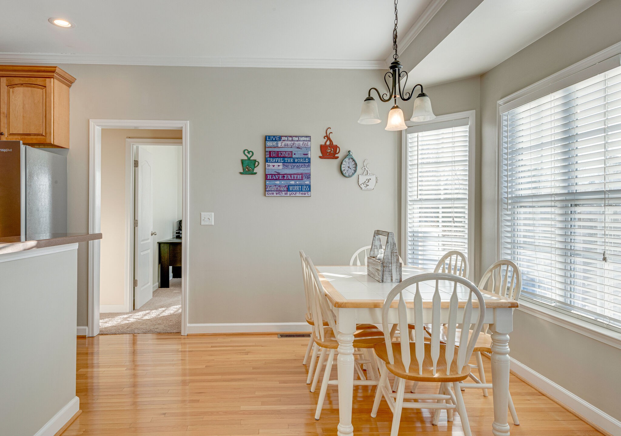 1686 Porter Road Bon Aqua, TN 37025 - Photo 8 of 28 a view of a dining room with furniture window and wooden floor