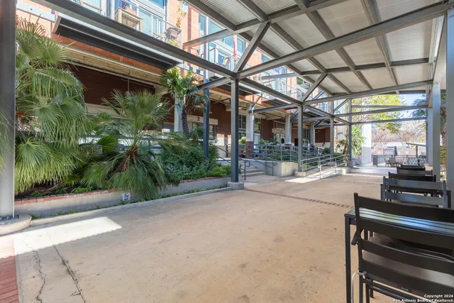 a garden view with a seating space