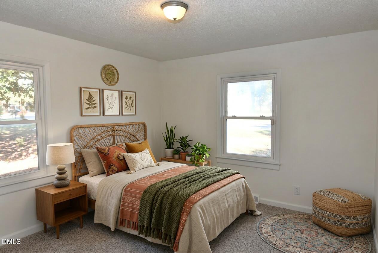 703 West Main Street Clinton, NC 28328 - Photo 8 of 19 Primary Bedroom Bohemian_Retreat_Style