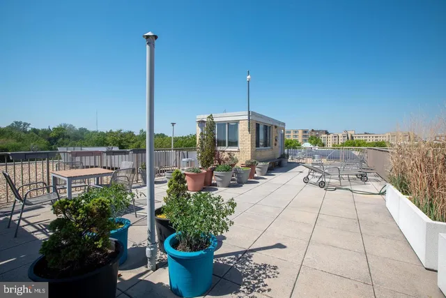 a view of a terrace with furniture