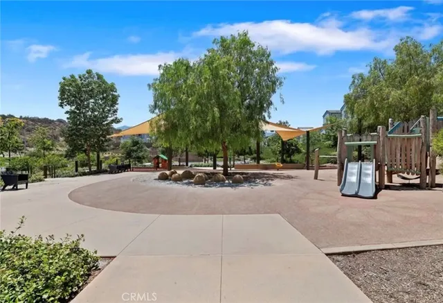 a view of street with tall buildings