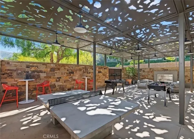 a outdoor space with patio lots of furniture